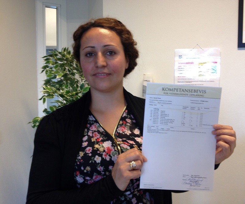 Foto: Liudmila Logacheva En deltaker med kompetansebevis